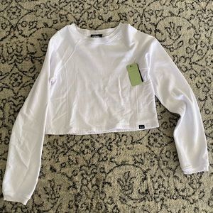 NUX cropped long sleeve pullover
